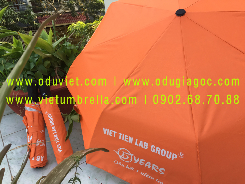 xưởng sản xuất ô dù cầm tay in logo quảng cáo